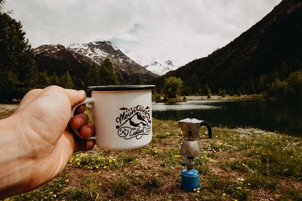drinking coffee on camping trip